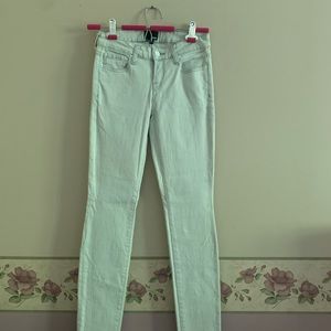 Never worn Wilfred high rise skinny jeans. Size 24